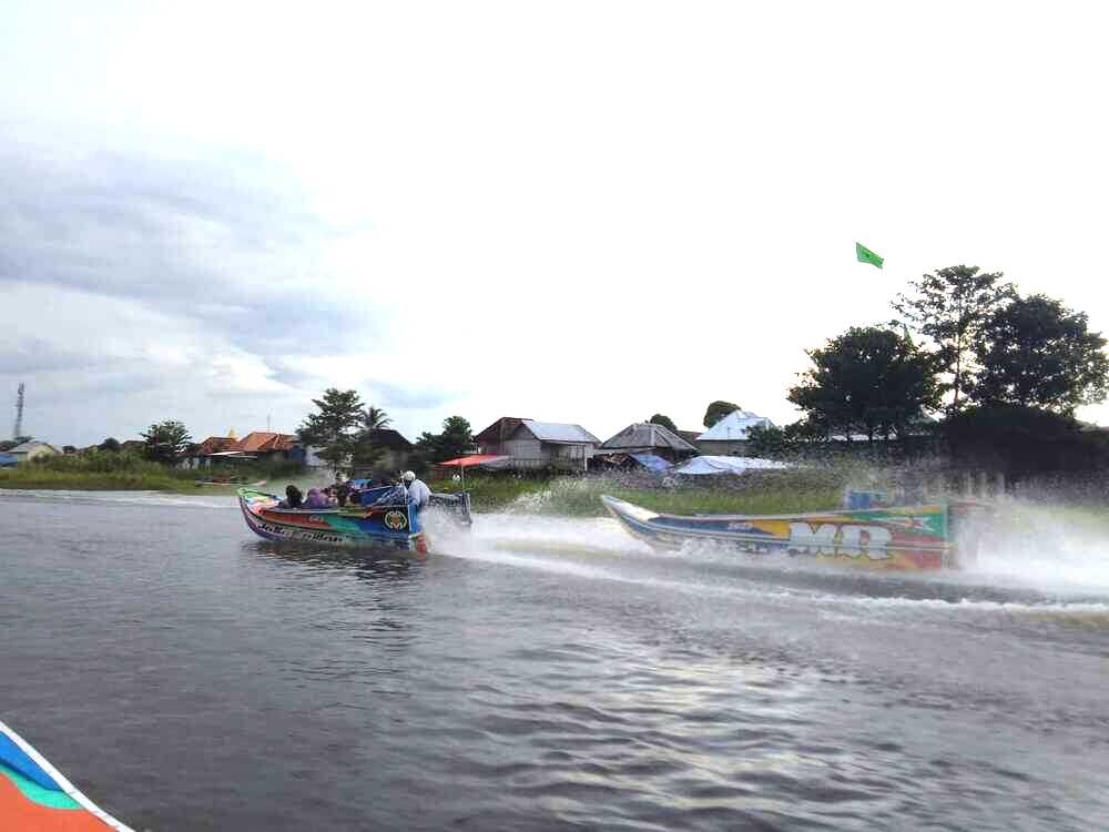 Wisata Ngebut Naik Speedboat di Sungai Ogan Selalu Diminati saat Lebaran Tiba   