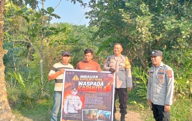 Kanit Binmas dan Babinsa Gencar Imbau Warga Plakat Tinggi Cegah Karhutla