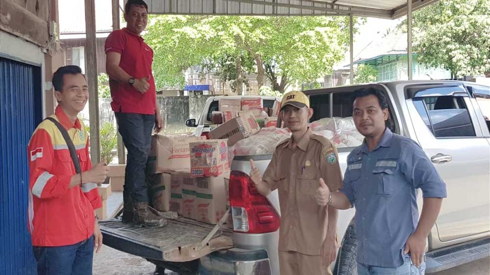 Salurkan 200 Paket Sembako, PT TBP Bantu Warga 3 Desa Terdampak Banjir