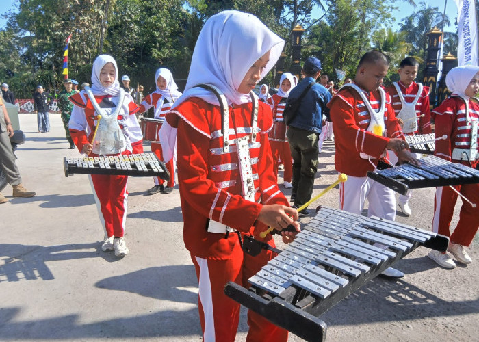 Saat Generasi Muda Ambil Bagian di TMMD ke-129 Desa Cukil: Drum Band dan KKN Melebur Jadi Satu!