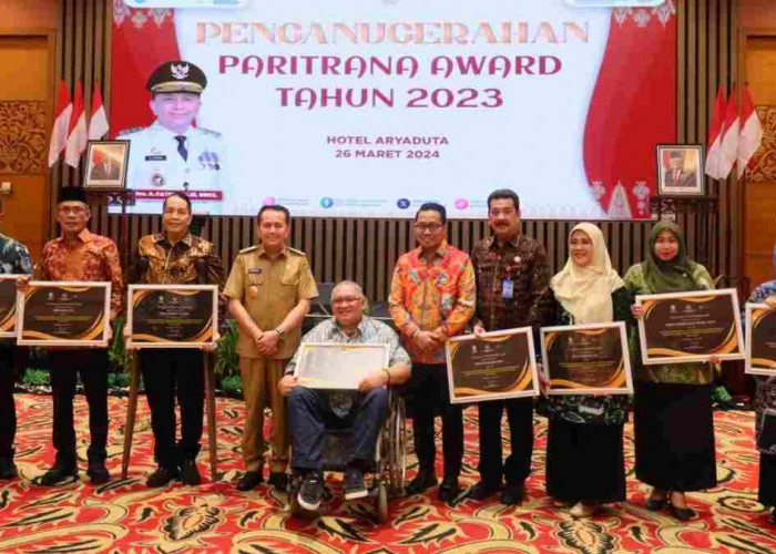 Pj Gubernur Agus Fatoni Serahkan Penghargaan Paritrana dan Canangkan GPPRS