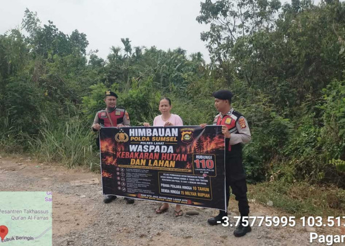 Polsek Kota Lahat Bentangkan Spanduk Larangan dan Imbau Warga Jangan Buka Lahan dengan Cara Membakar