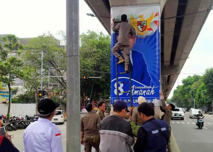 Bandel, Stiker APK Caleg di Tiang LRT Palembang Kembali Dicopot, Kasi Ops PolPP: Bukan Pada Tempatnya!