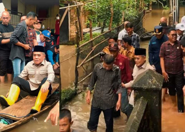 Naik Perahu Terjang Banjir, Wabup Ogan Ilir Pastikan Bantuan Sembako Sampai ke Tangan Warga