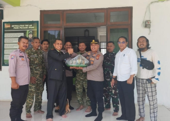 Sambangi Koramil Babat Toman, Kapolsek Sanga Desa Sampaikan Ucapan HUT TNI