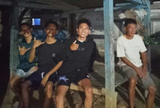Wujudkan Kampung Aman dan Kondusif, Babinsa Koramil 405-07 Pulau Pinang Bareng Warga Siaga di Pos Satkamling