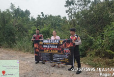 Polsek Kota Lahat Bentangkan Spanduk Larangan dan Imbau Warga Jangan Buka Lahan dengan Cara Membakar